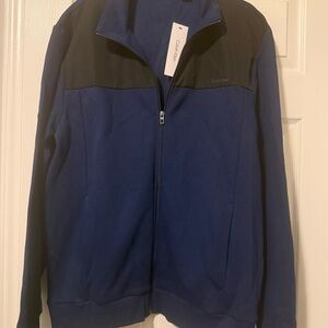 Brand new with a tag Calvin Klein Navy and Black Zip-Up size XL/TG